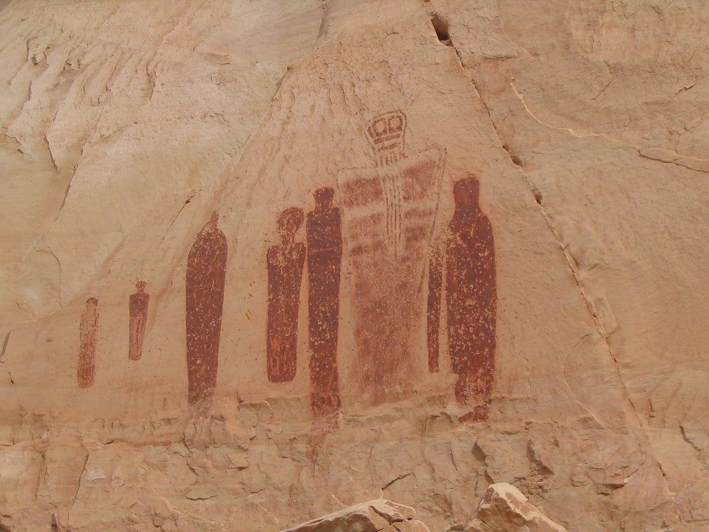 Barrier Canyon-style pictograph figures painted on a sandstone alcove wall at the Great Gallery in Horseshoe Canyon, Canyonlands National Park.